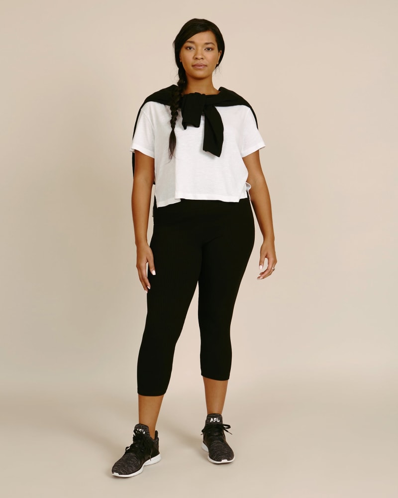 Front of a model wearing a size 2X Chunky Rib Crop Legging in Black by LNA. | dia_product_style_image_id:226758